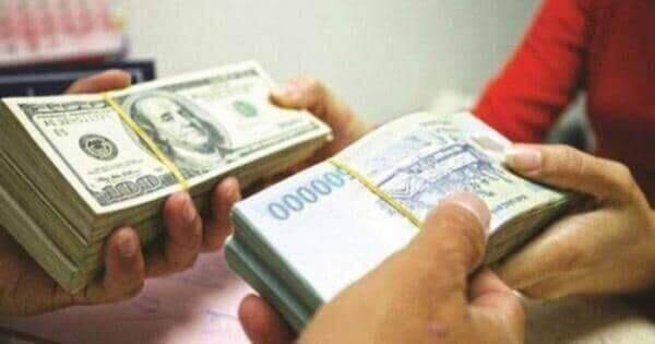 Áp lực từ thị trường quốc tế, tiền đồng mất giá trong tháng 2