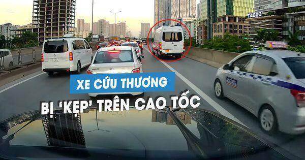 Xe cứu thương bị hàng loạt ô tô chạy sai luật ‘kẹp’ trên làn dừng khẩn cấp