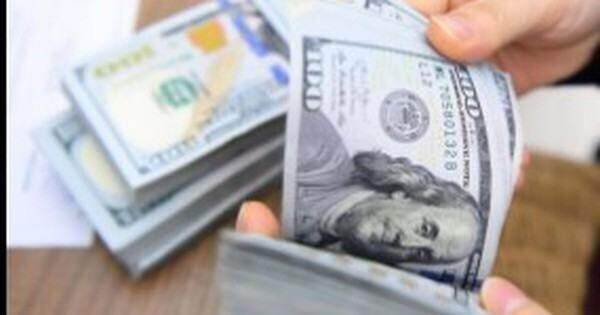 Thị trường tự do tiến sát 26.000 VND/USD