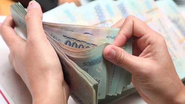 Người lao động phải ngừng việc do thiên tai, bão lũ, tiền lương trả thế nào?