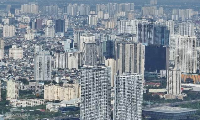 Delayed housing projects restarted but find few buyers