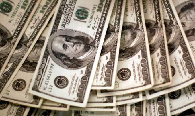 Dollar gains little over dong