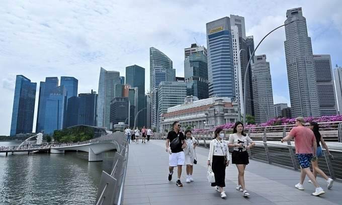 Singapore households to receive 0 vouchers to help ease rising cost of living