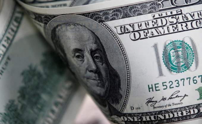 Dollar gains little against dong on black market
