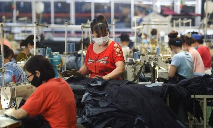 HCMC exporters halt hiring over fears of US tariff impact