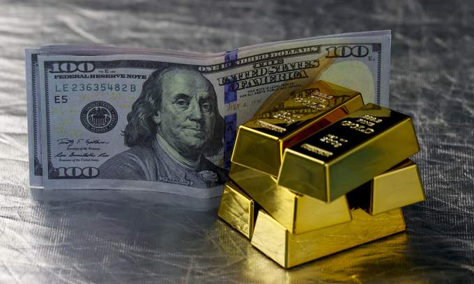 Gold prices stall as investors turn to dollar hedge amid Iran conflicts Gold prices stall as investors turn to dollar hedge amid Iran conflicts