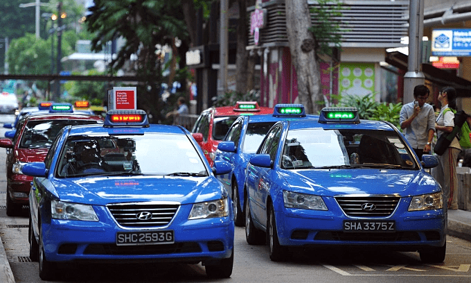 Singapore to give out 5 cash to eligible platform workers, taxi drivers Singapore to give out 5 cash to eligible platform workers, taxi drivers