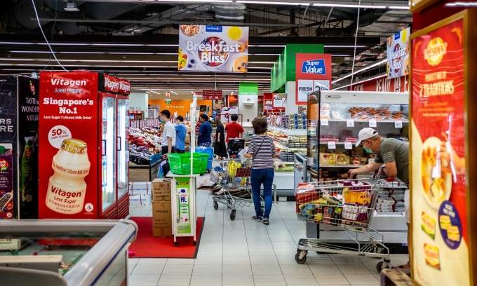 Singapore supermarket chains launch promotions featuring government vouchers to support households