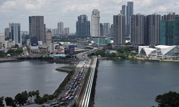Singaporeans expected to spend 3M more a year in Malaysia’s Johor Bahru with new cross-border rail link Singaporeans expected to spend 3M more a year in Malaysia’s Johor Bahru with new cross-border rail link